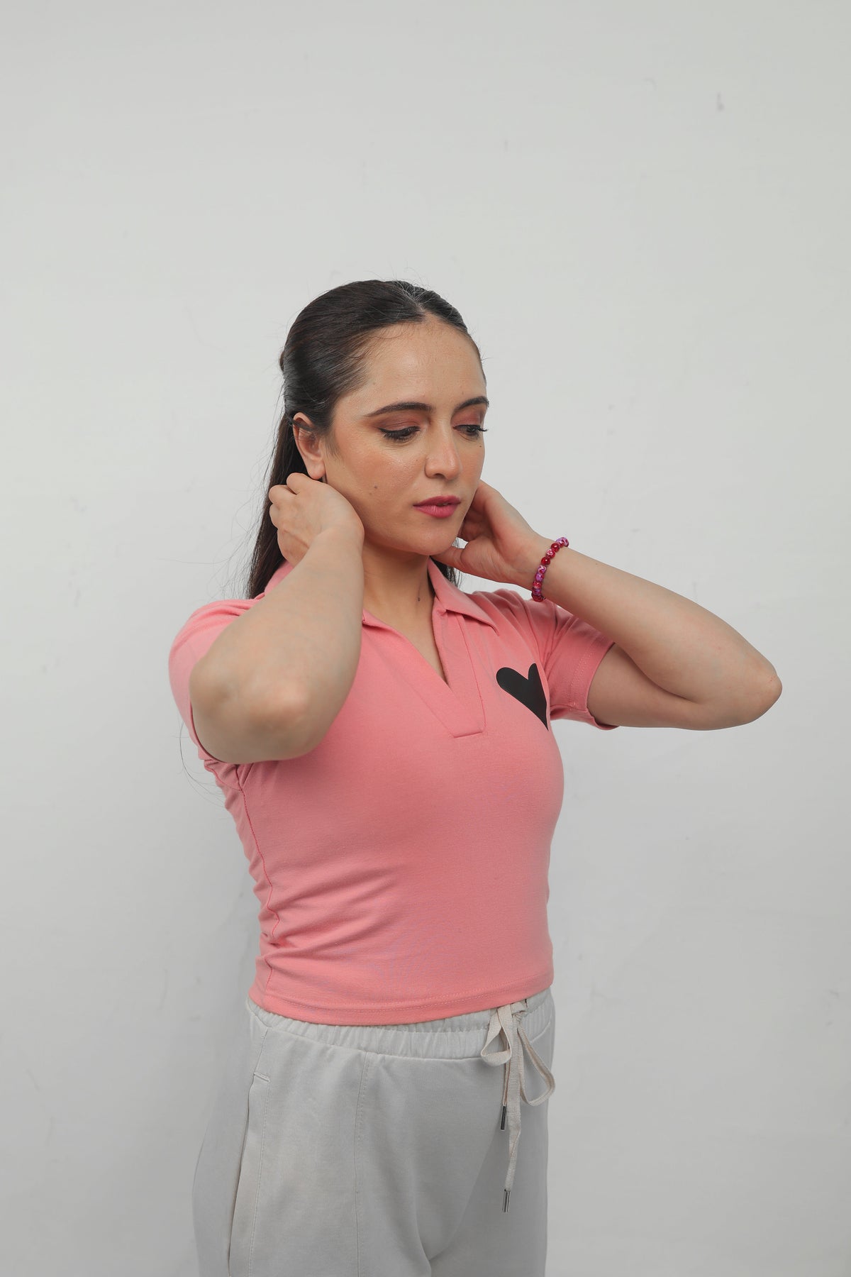 ELUX Minimal Heart Polo Crop Top angled view
